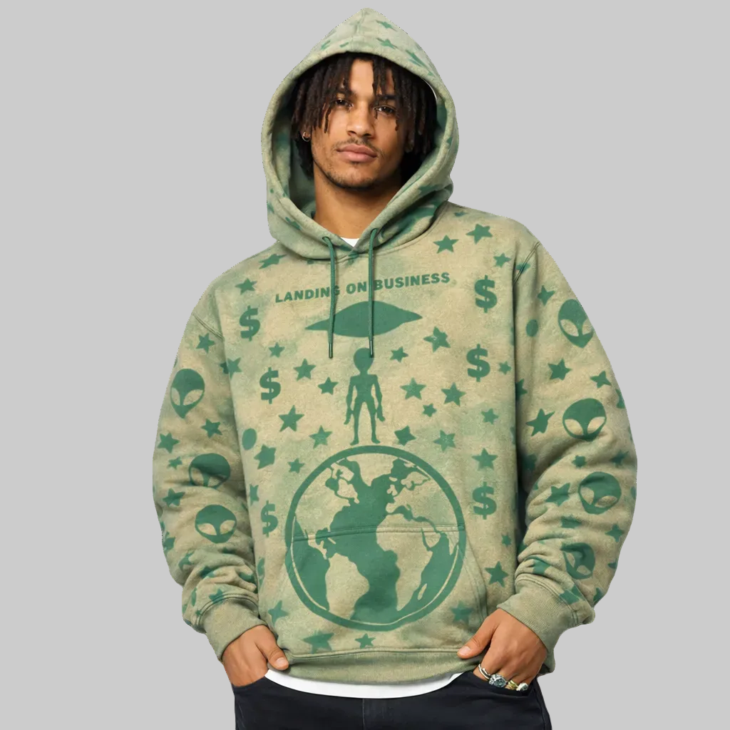 Person wearing a green hoodie with graphic designs and text on a white background