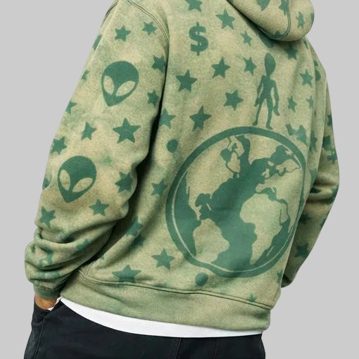 Green hoodie with alien and star patterns on a white background