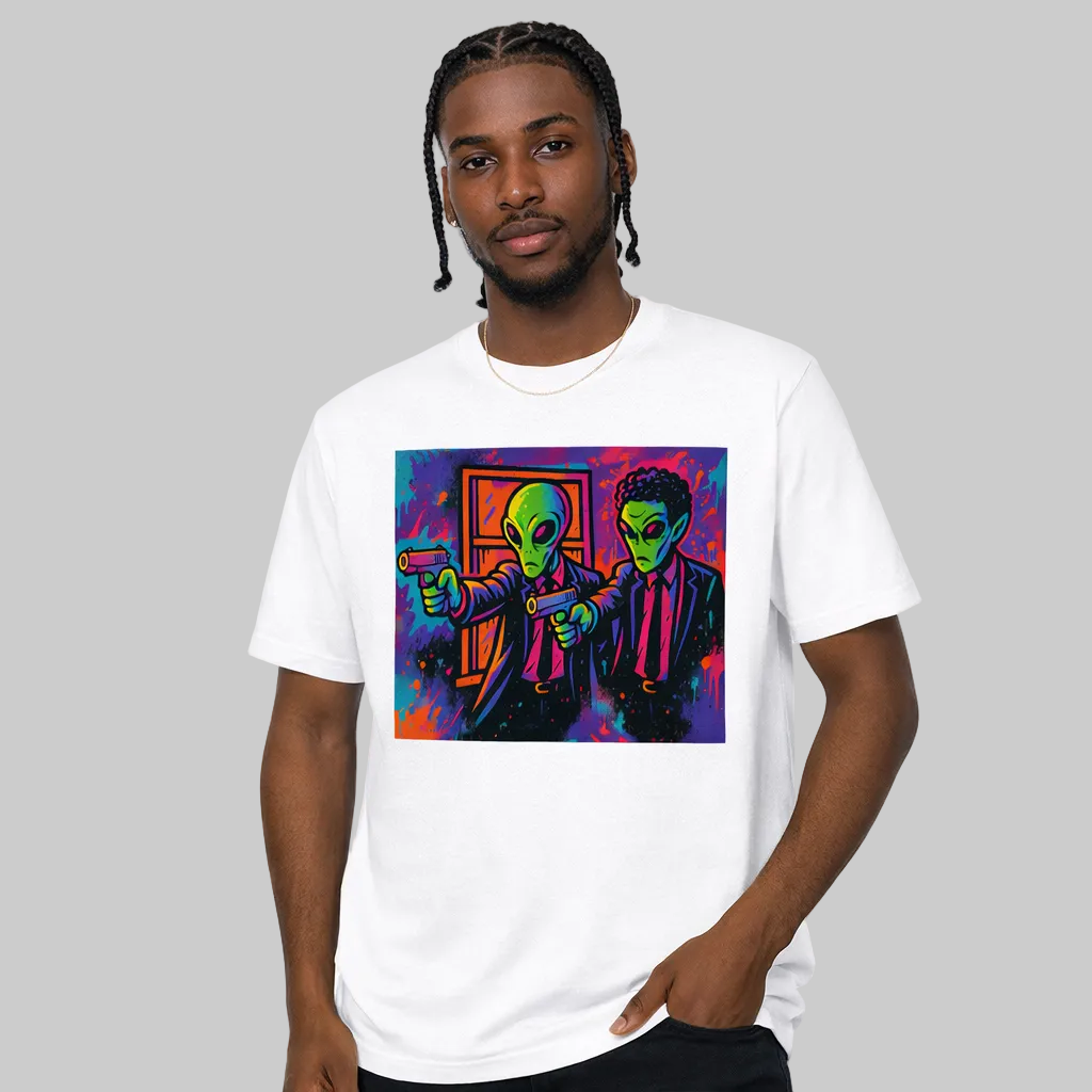 Person wearing a white t-shirt with a colorful graphic of two aliens holding guns.
