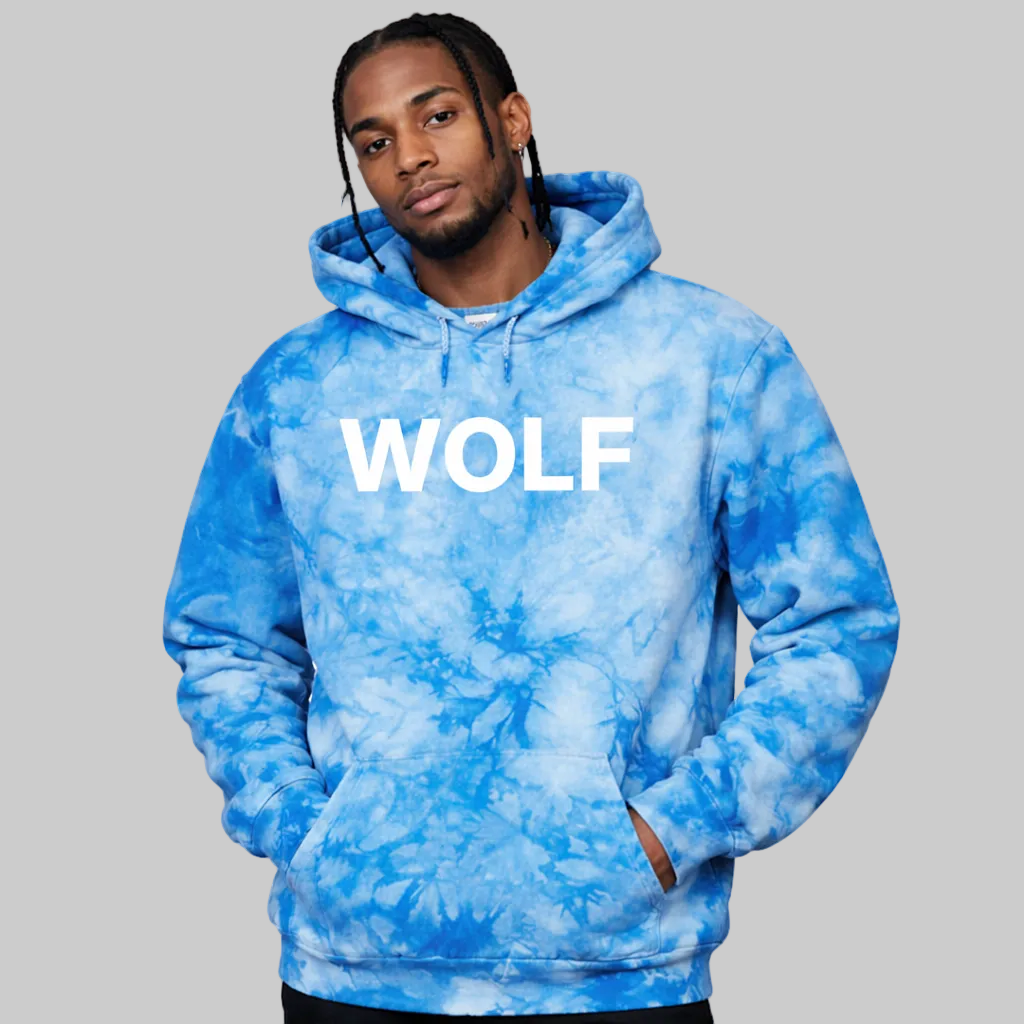 Person wearing a blue tie-dye hoodie with 'WOLF' text on a white background