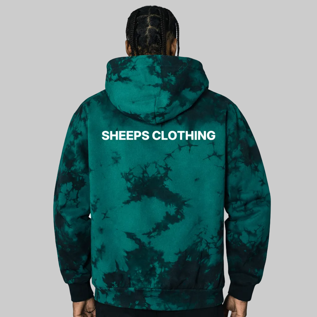 Green tie-dye hoodie with 'Sheeps Clothing' branding on the back, worn by a person.