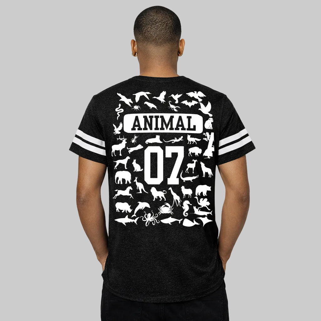 Black t-shirt with white animal illustrations and text on the back, worn by a person.