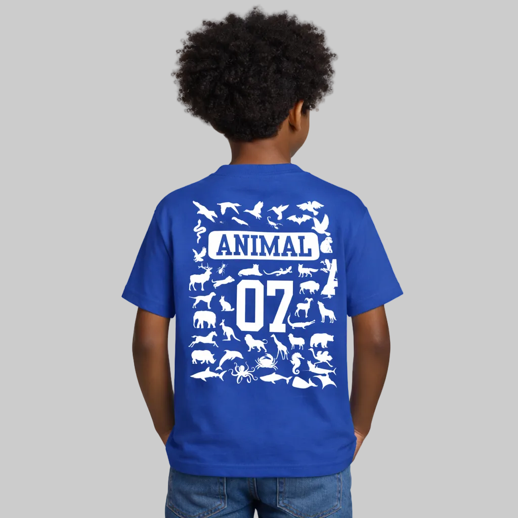 Child wearing a blue t-shirt with white animal illustrations and text on the back