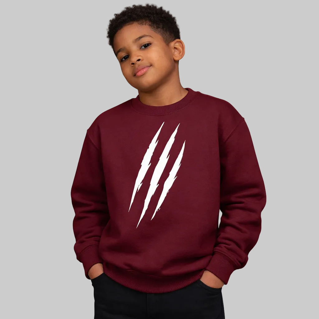 Child wearing a maroon sweatshirt with white graphic design on a plain background