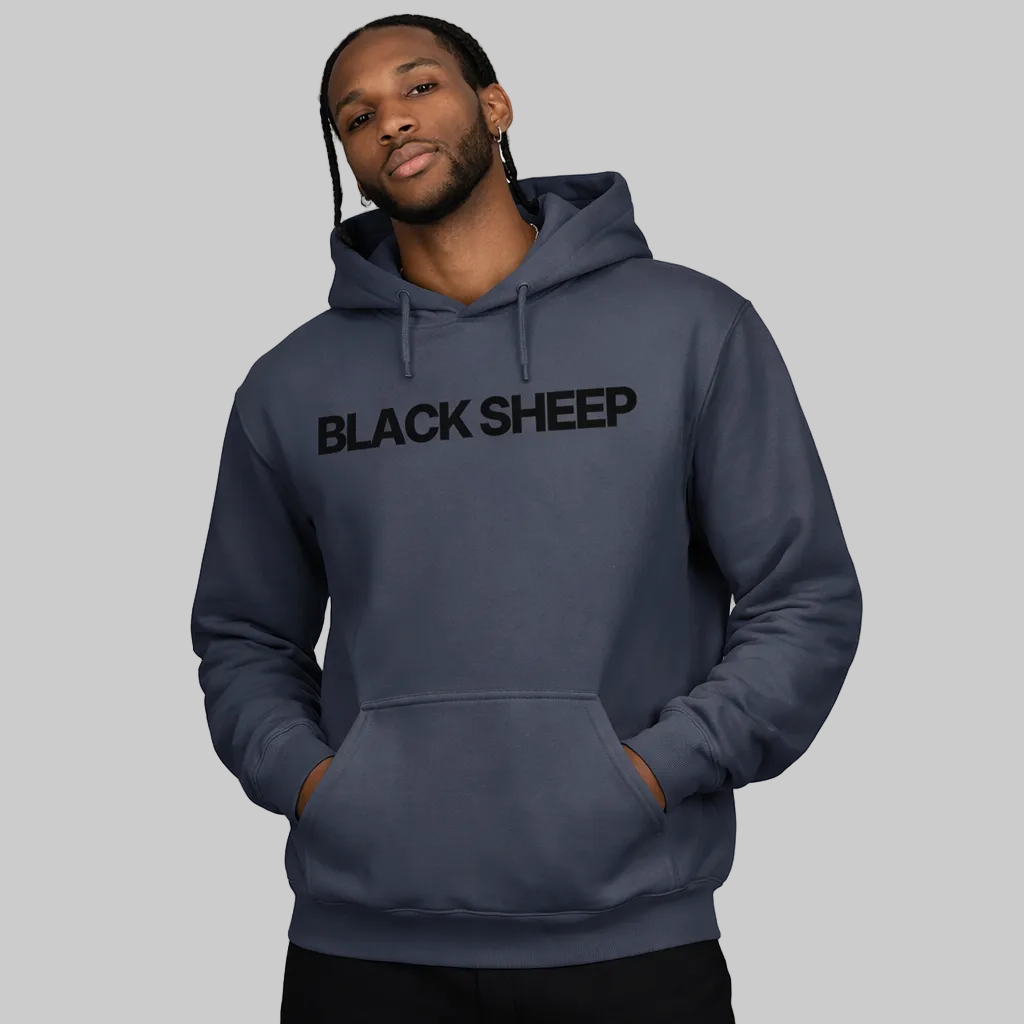 Man wearing a gray hoodie with 'BLACK SHEEP' text on a white background