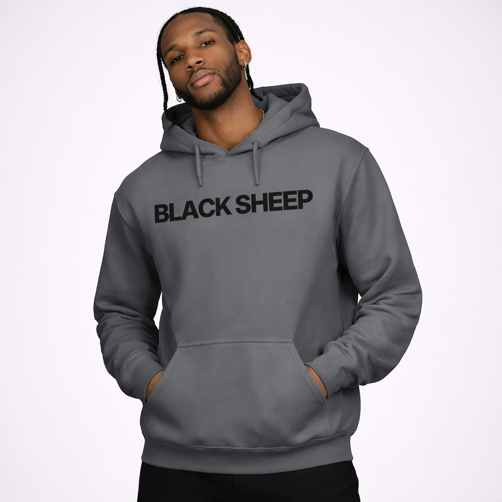 Man wearing a gray hoodie with 'BLACK SHEEP' text on a white background