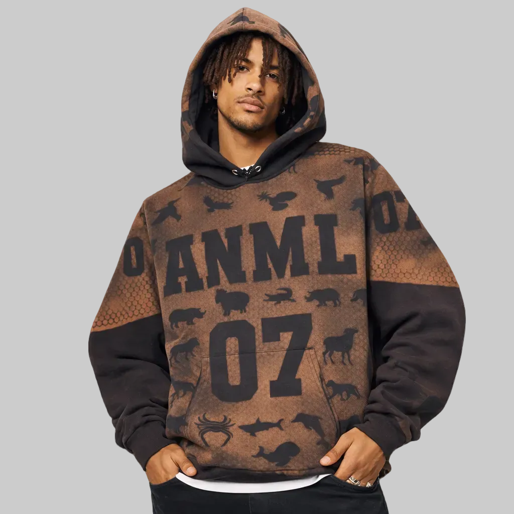 Man wearing a brown and black hoodie with 'ANML 07' design on a gray background