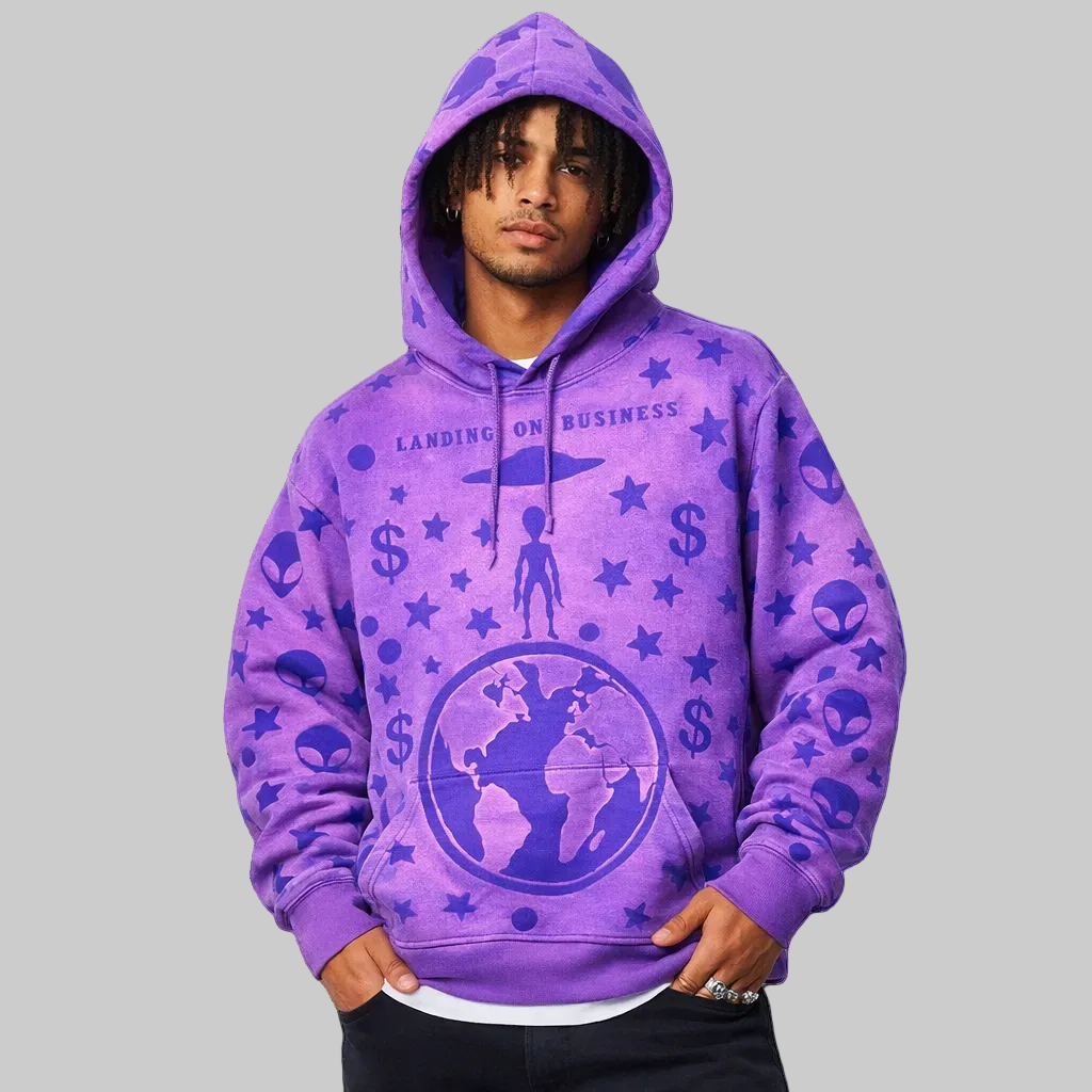 Person wearing a purple hoodie with various symbols and text on a white background