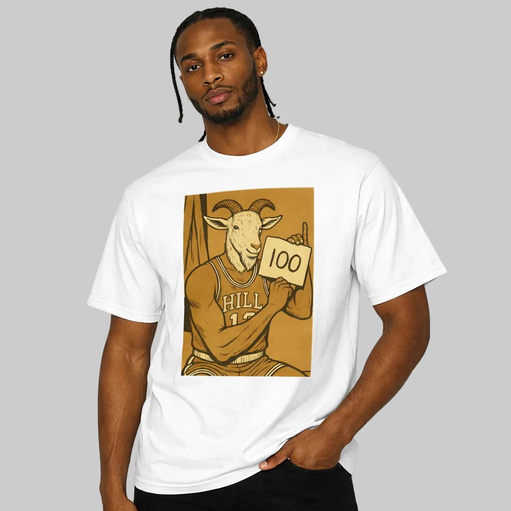 Man wearing a white t-shirt with a graphic design of a ram holding a '100' sign on a beige background.
