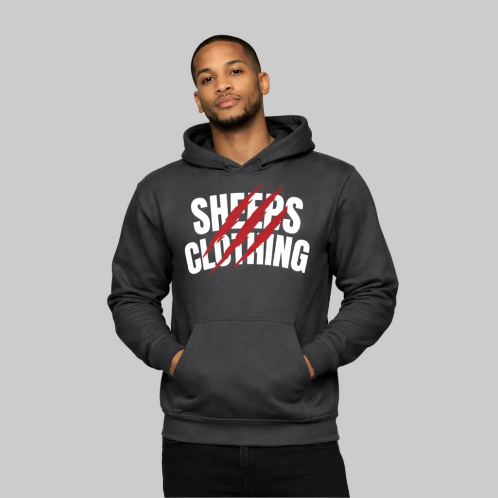 Man wearing a dark gray hoodie with 'Sheep's Clothing' text on a white background