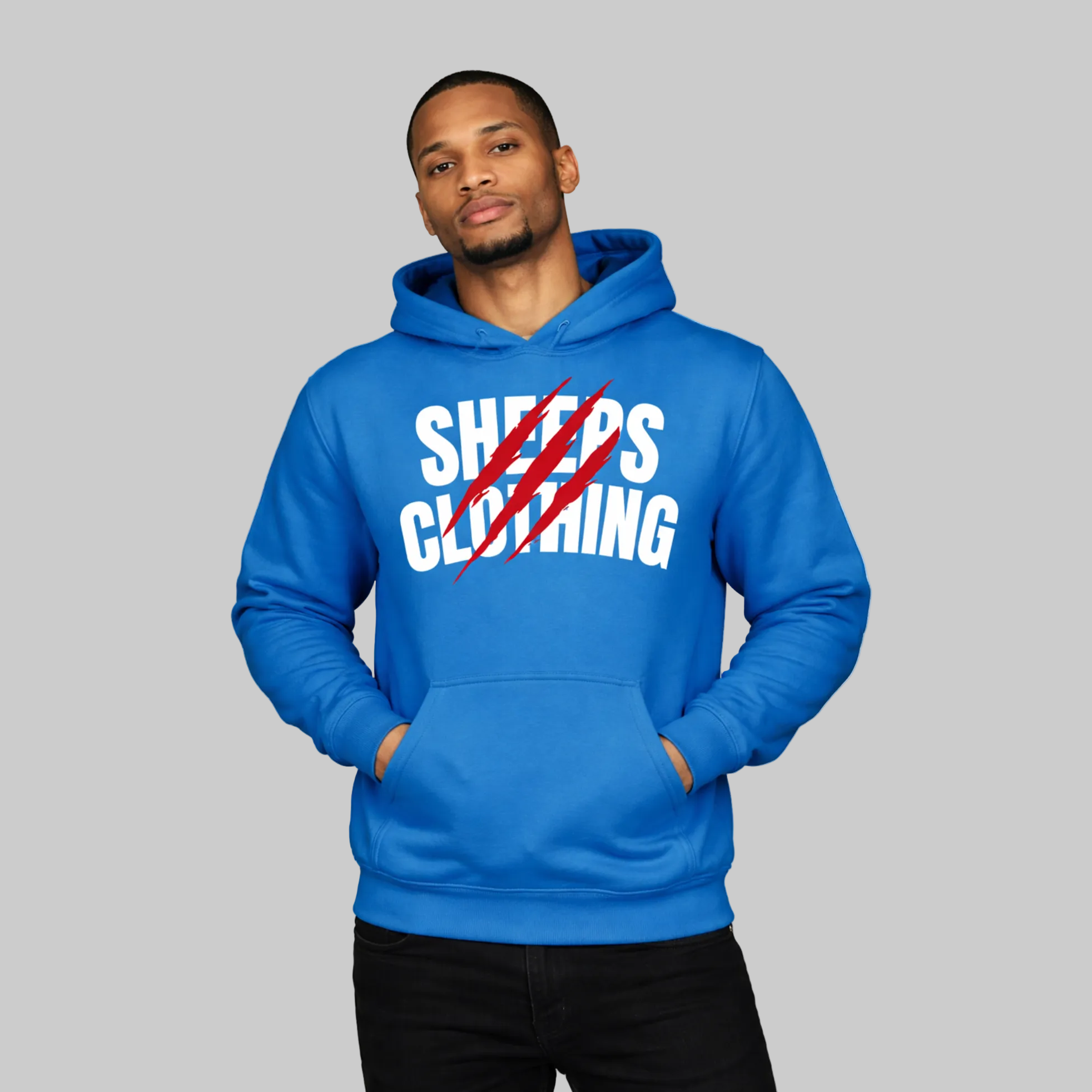 Man wearing a blue hoodie with 'Sheep's Clothing' text on a white background